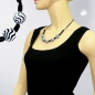 Mobile Preview: Halskette Kunststoffperlen Wellenperle weiß-schwarz Kordel schwarz 50cm