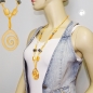 Mobile Preview: Halskette Kunststoffperlen Schnecke gelb altsilberfarben Kordel gelb 80cm