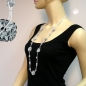 Mobile Preview: Halskette Kunststoffperlen Blumenringe schwarz-weiß Kordel weiß 100cm