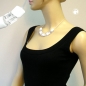 Preview: Halskette Schrägperle weiß und kristallklar Kunststoffperlen mit Silikonschnur weiß 45cm